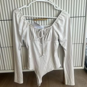 Cream long sleeve bodysuit